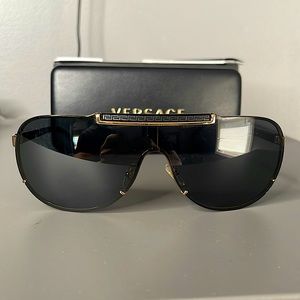 Versace shield sunglasses. Black lens with gold trim